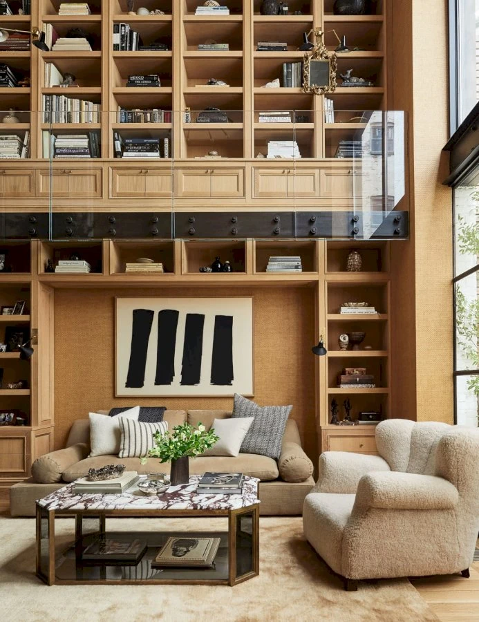 Nate Berkus & Jeremiah Brent’s NYC Townhouse Has a Dreamy Double-Height Wall of Books