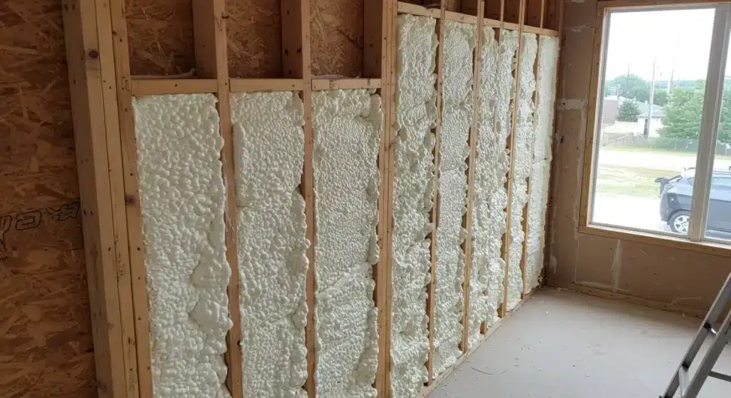How Can Home Insulation Help Address Drafts Around Windows, Doors, and Exterior Walls?