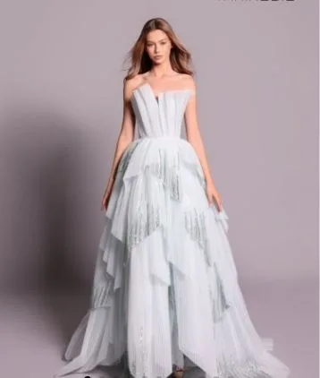 Wedding Gown Tailoring Focus: How to Decide What Type of Bustle is Best for Your Wedding