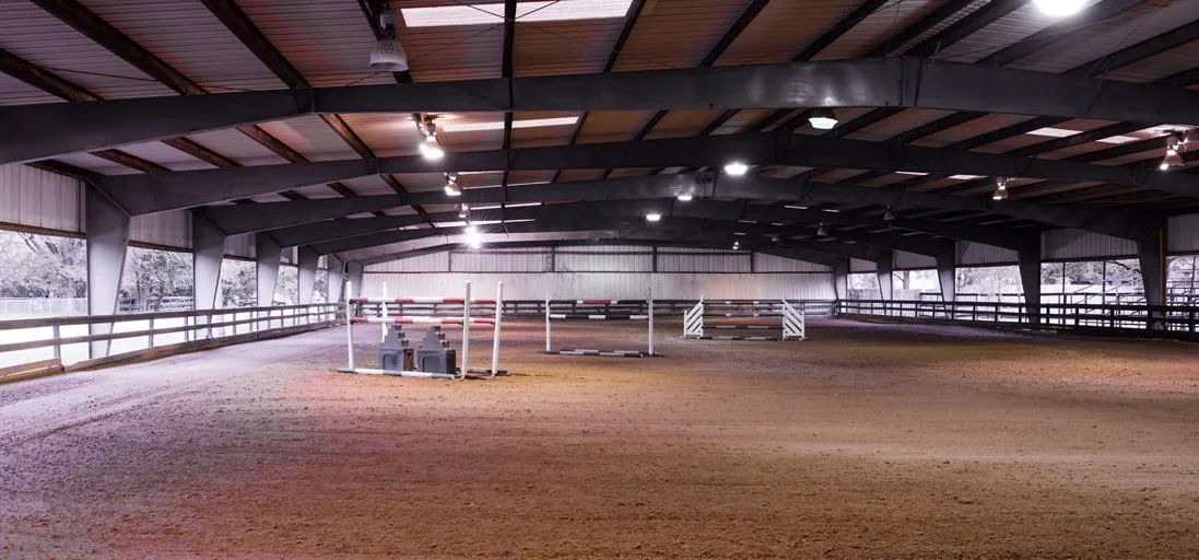 Indoor Horse Arenas: The Benefits of Year-Round Riding and Better Footing Control