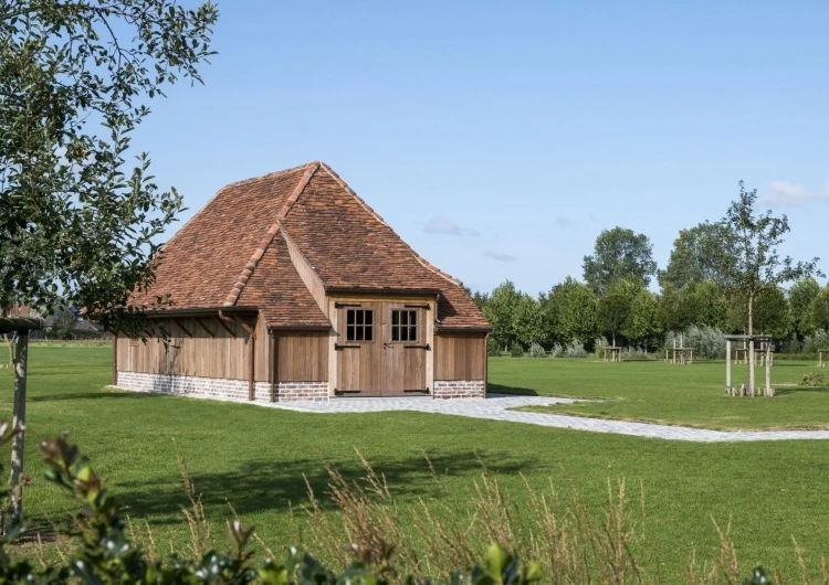 Ontdek uw droomtuin met exclusieve tuinhuizen op maat van Wood Arts nu