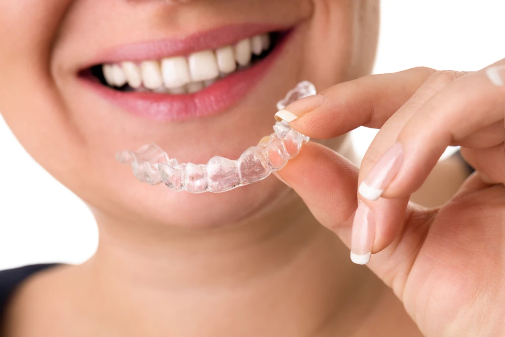 How Long Do You Really Have to Wear a Clear Retainer After Braces?