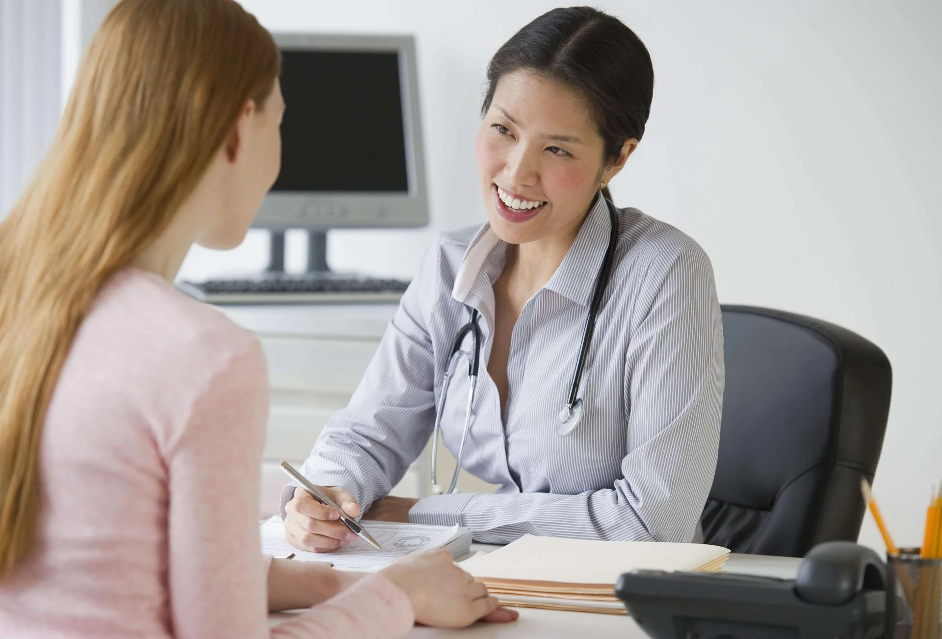 How does a gynecologist help manage menstrual pain?