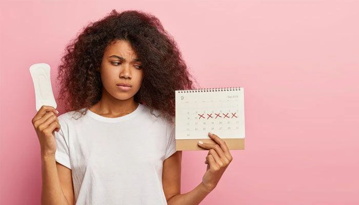 What are the common causes of irregular menstrual cycles?