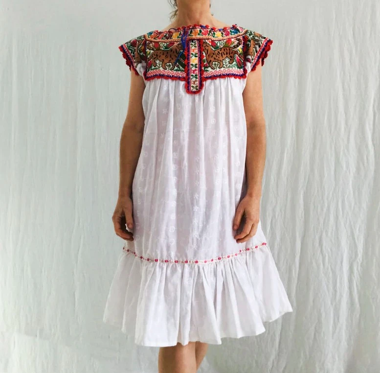 Breezy Elegance Defined by the Oaxacan Embroidered Dress and Banana Leaf Print Dress