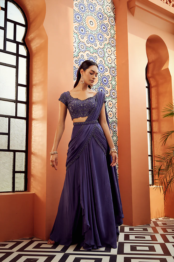 Effortless Elegance: Exploring the Allure of Pre-Draped Sarees and Fish Cut Lehengas