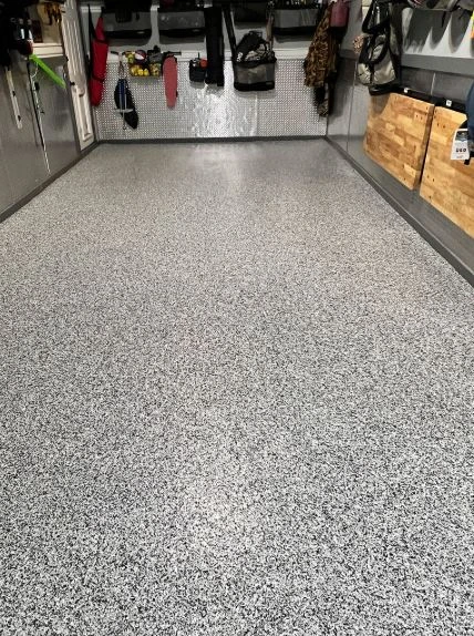 How Garage Floor Coating in Minneapolis Extends the Life of Concrete