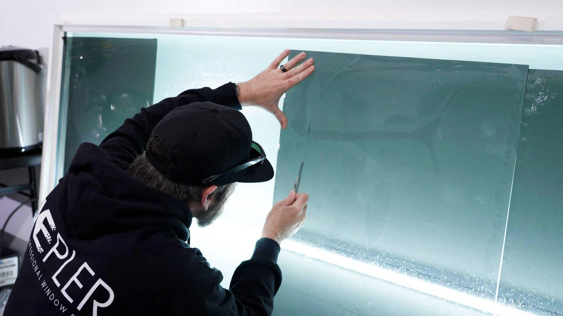 Why Commercial Buildings Choose Neutral vs Reflective Window Tint