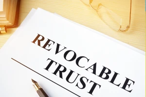 How Is a Revocable Living Trust Taxed While the Grantor Is Still Alive in New Jersey?