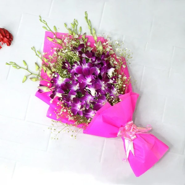 6 Purple Orchids wrapped in special paper