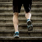 A person walking up a flight of stairs