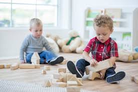 Kids Develop Skills By Playing With Wooden Play Blocks