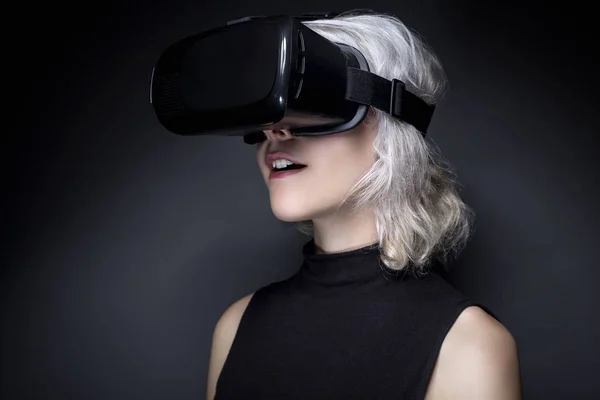 depositphotos_138287874-stock-photo-woman-with-vr-virtual-reality-0f1f4955