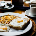 Breakfast and eggs on a plate in a restaurant in Miami