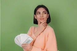 Screenshot 2023-06-20 at 18-22-15 Free Photo Young woman in casual peach sweater isolated on green olive wall