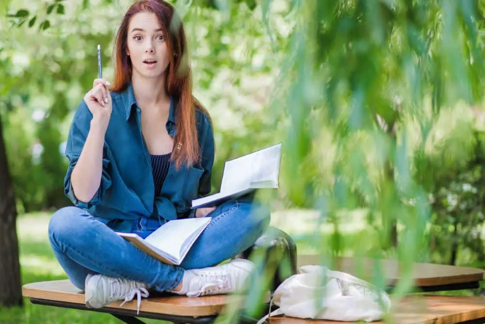 woman-with-notebooks-park2