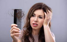 hair-loss-with comb