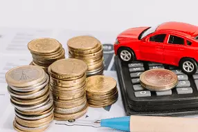 Screenshot 2023-09-12 at 17-38-25 Free Photo Stack of coins calculator toy car and pen on template