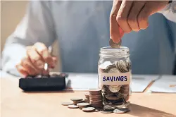 Screenshot 2023-09-25 at 18-42-00 Premium Photo Mens hand holding coins putting in glass saving money and investing concept saving money for finance accounting