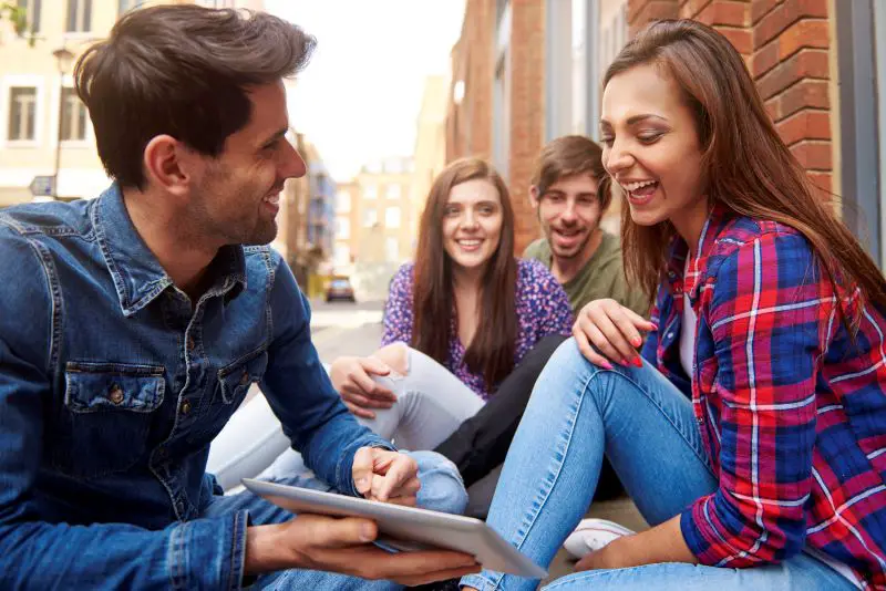 young-people-sitting-pavement1