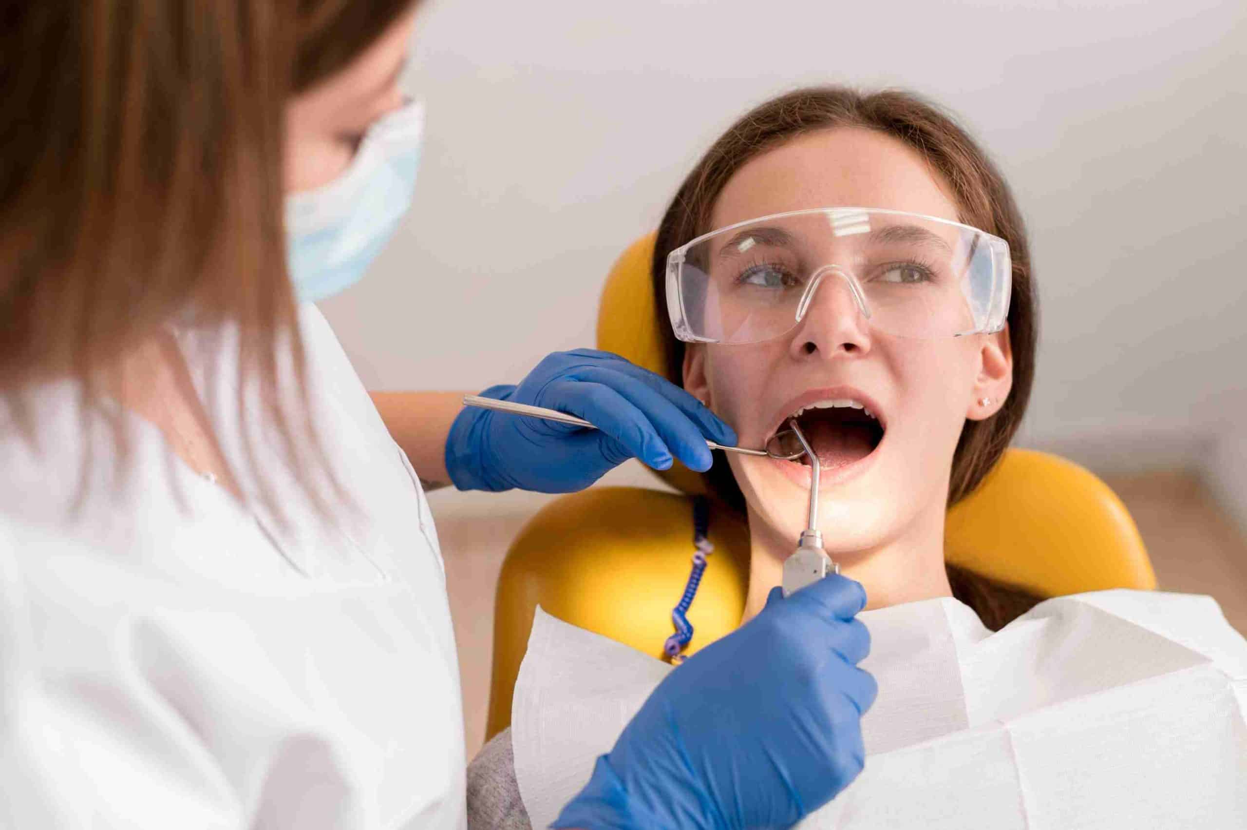 dentist-checking-patient-mounth-care (1) (1)