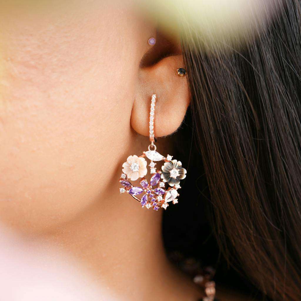 a-person-wearing-a-floral-earring-7618569-1024x1024